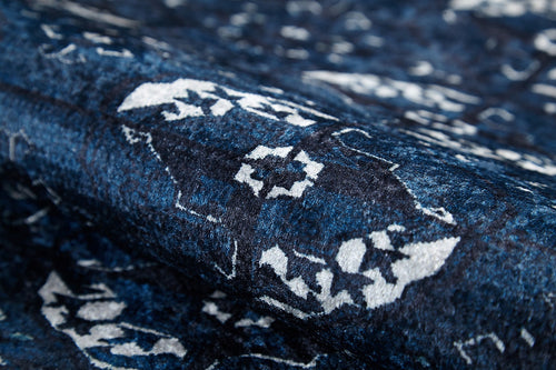 Load image 1 in gallery view. Close-up of the Tribal Trail - Washable Rug - JR1939, featuring blue and white raised texture with abstract and floral patterns—durable and perfect for high-traffic areas.