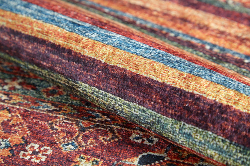 Load image 1 in gallery view. A close-up of the Tropic Thunder - Washable Rug - JR5077 (Outlet) US shows its rolled, multicolor stripes and intricate designs—perfect for adding vibrant style and easy care to high-traffic spaces.
