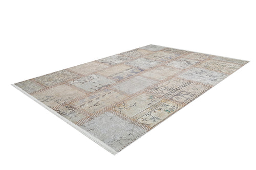 Load image 1 in gallery view. The Urban Utopia - Washable Rug - JR1957 is a rectangular, patchwork-style flat weave rug in muted beige, cream, and light brown tones with subtle patterns and floral designs, showcased on a white background.
