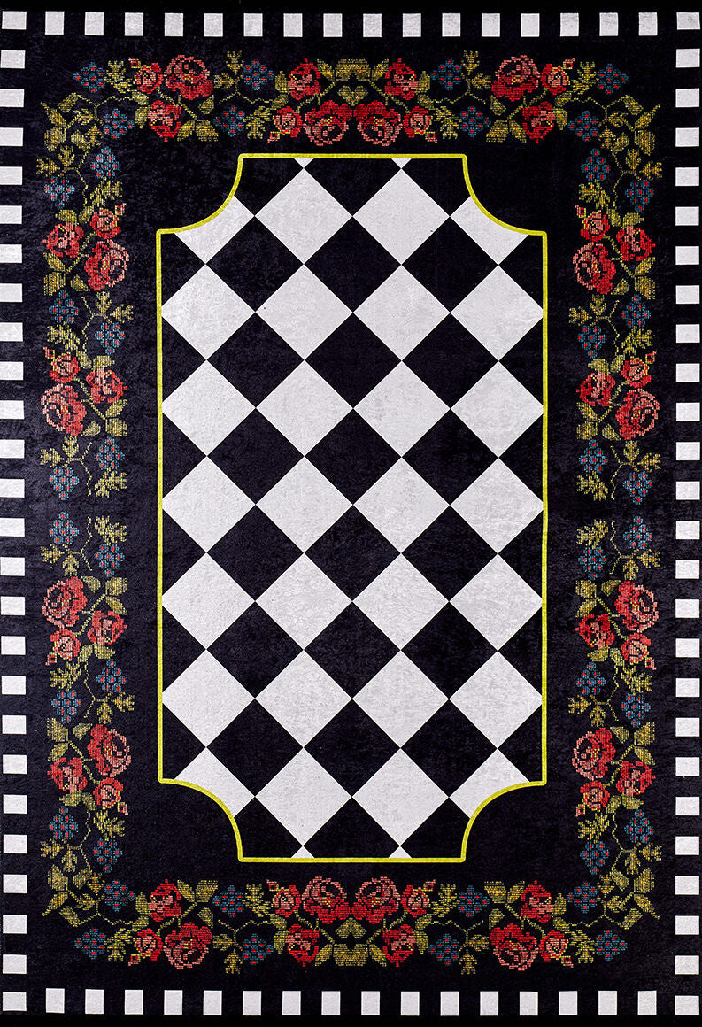 The Wildflower Wonderland - Washable Rug - JR587 is a flat weave black rug with a black and white diamond checkerboard center, yellow borders, and a vibrant floral pattern of red, blue, and green flowers on a washable black background.