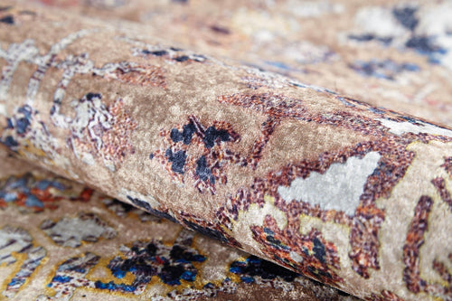 Load image 1 in gallery view. A close-up of the Native Nature's Washable Rug - JR1666 (Outlet) US shows its soft, textured, patterned flat weave in beige, brown, and muted tones with abstract and floral-inspired designs.