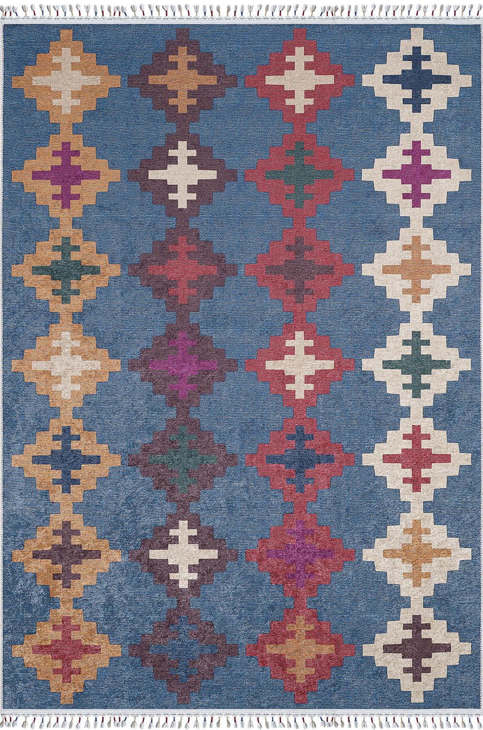 The Nomad's Mirage - Washable Rug - JR5032 features a multicolored geometric diamond pattern in yellow, red, purple, green, and white on a blue background, arranged in vertical rows and finished with fringed edges.
