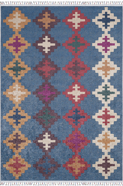 Load image 1 in gallery view. The Nomad's Mirage - Washable Rug - JR5032 features a multicolored geometric diamond pattern in yellow, red, purple, green, and white on a blue background, arranged in vertical rows and finished with fringed edges.