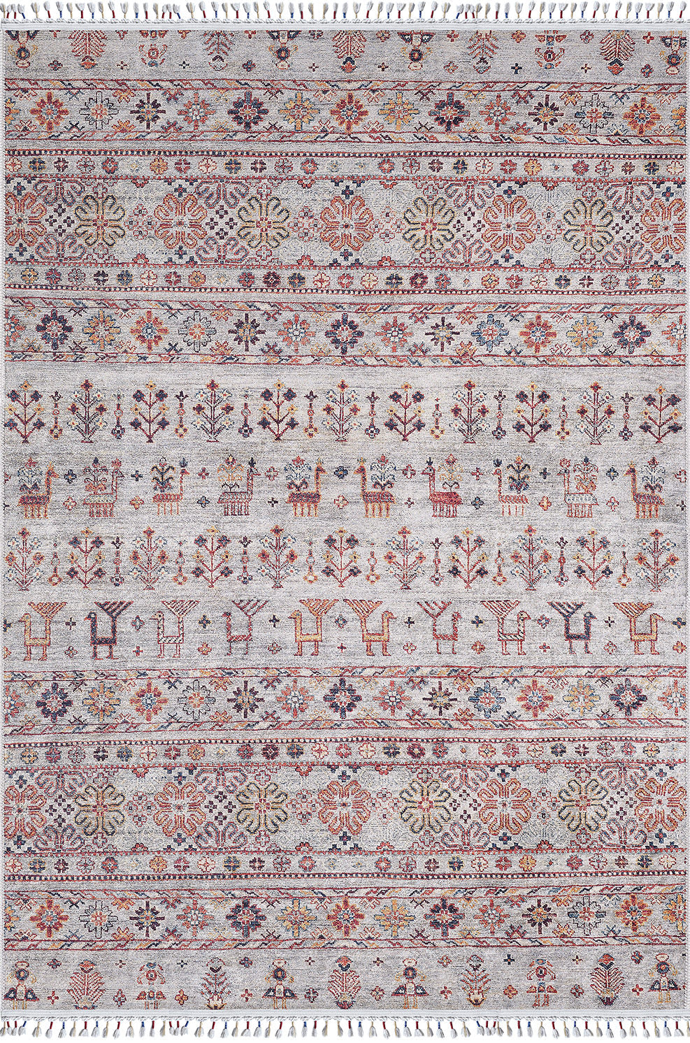 The Nomad's Nest - Washable Rug - JR5088 features a light gray base with vibrant geometric, floral, animal, and tree motifs in red, orange, blue, and gold. It’s ideal for high-traffic areas and finished with fringe on both ends.